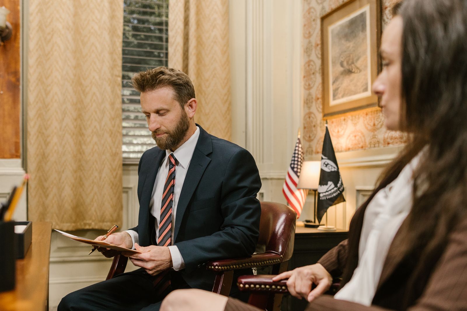 Attorney reviewing documents with a client